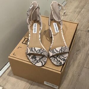 Brand New Steve Madden Irinee Size 7. Color is Snake.